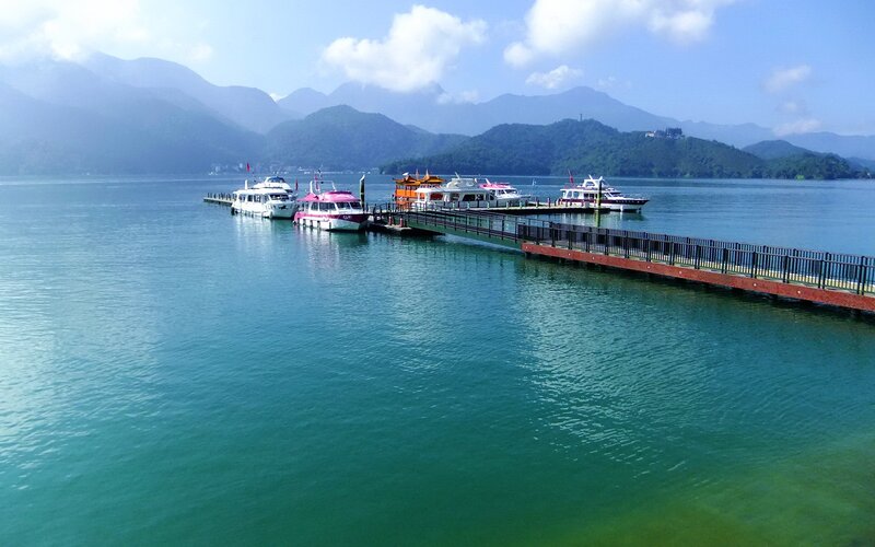 Boats at a Lake Dock — Blue, Serene, Afternoon, Photograph, Mountains