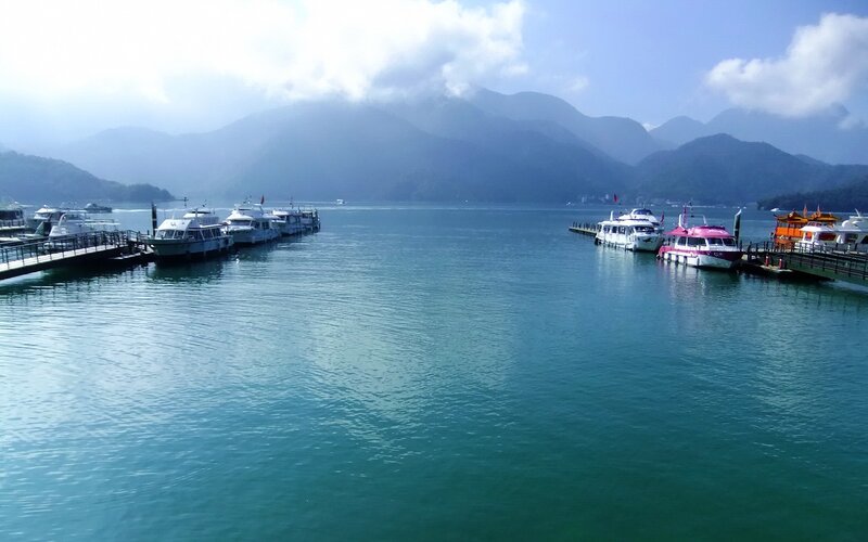 Boats at a Lake Dock — Blue, Serene, Afternoon, Photograph
