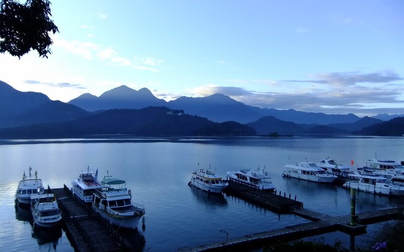 Boats at a Lake Dock — Blue, Serene, Morning, Photograph