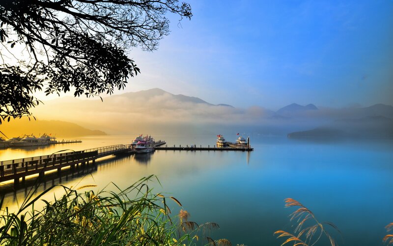 Boats at a Lake Dock — Blue, Serene, Sunrise