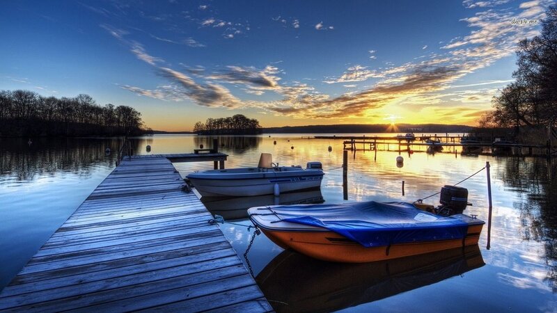Boats at a Lake Dock — Blue, Serene, Sunset, Photograph, Trees