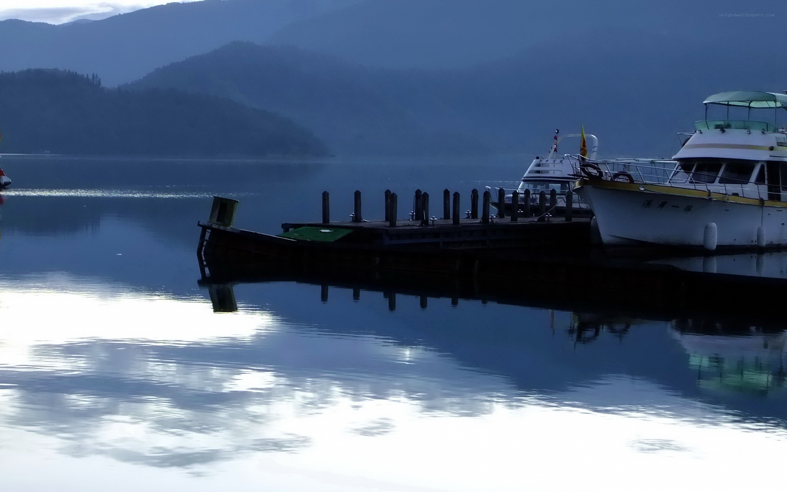 Boats at a lakeside dock