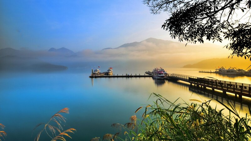 Boats at a Lakeside Dock — Blue, Serene, Morning