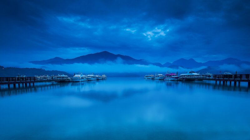 Boats at a Lakeside Dock — Blue, Serene, Night