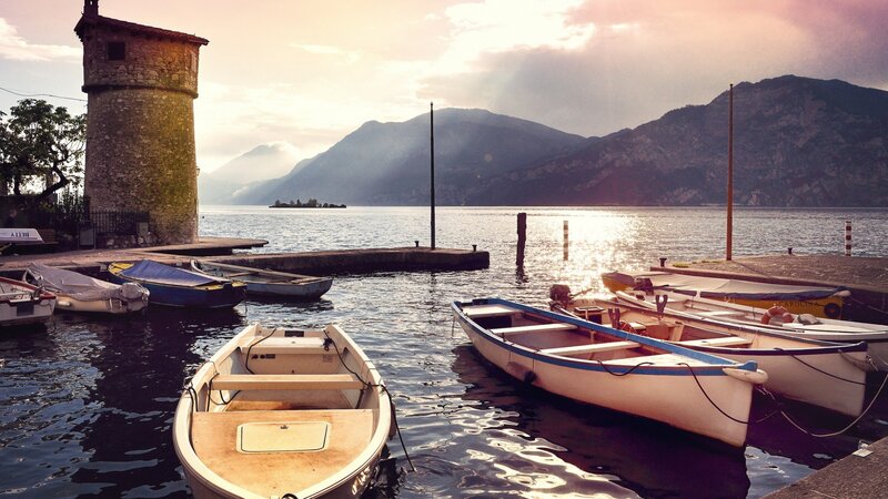 Boats at a Lakeside Dock — Blue, Serene, Sunset