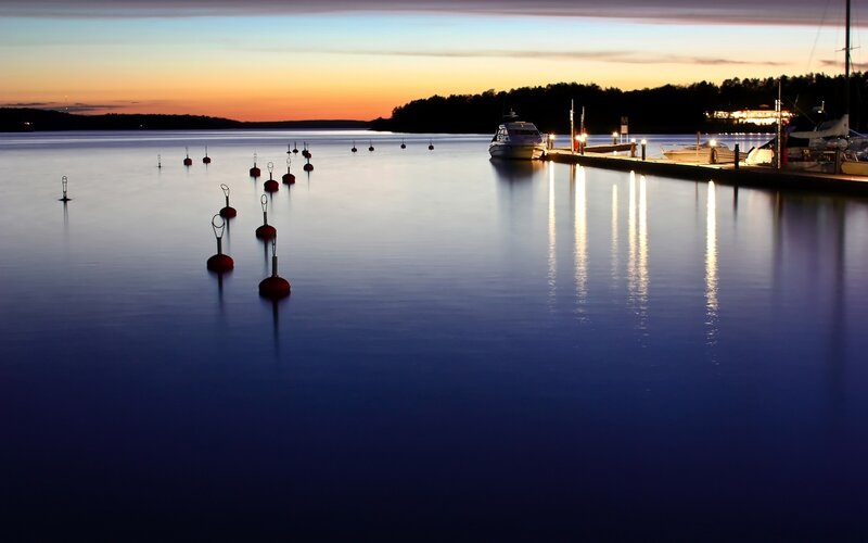 Boats at a marina at dusk