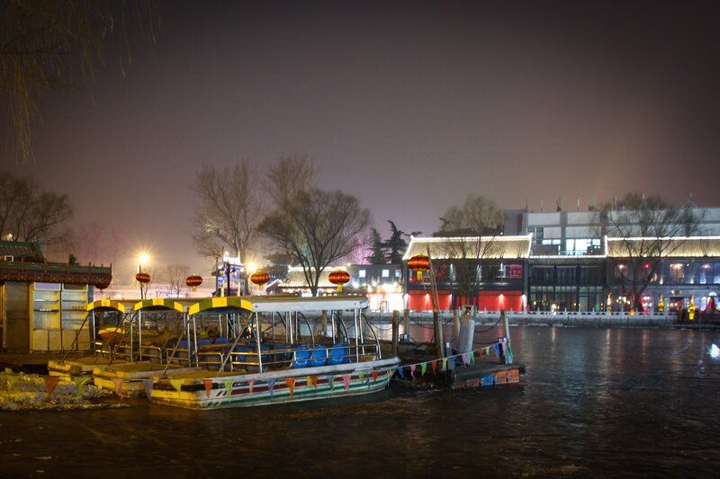 Boats at a Riverside Dock — Black