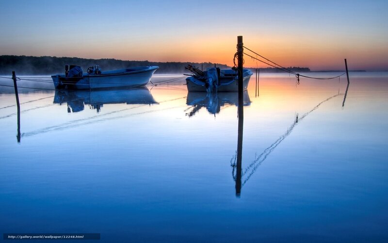 Boats at Dawn on Calm Water