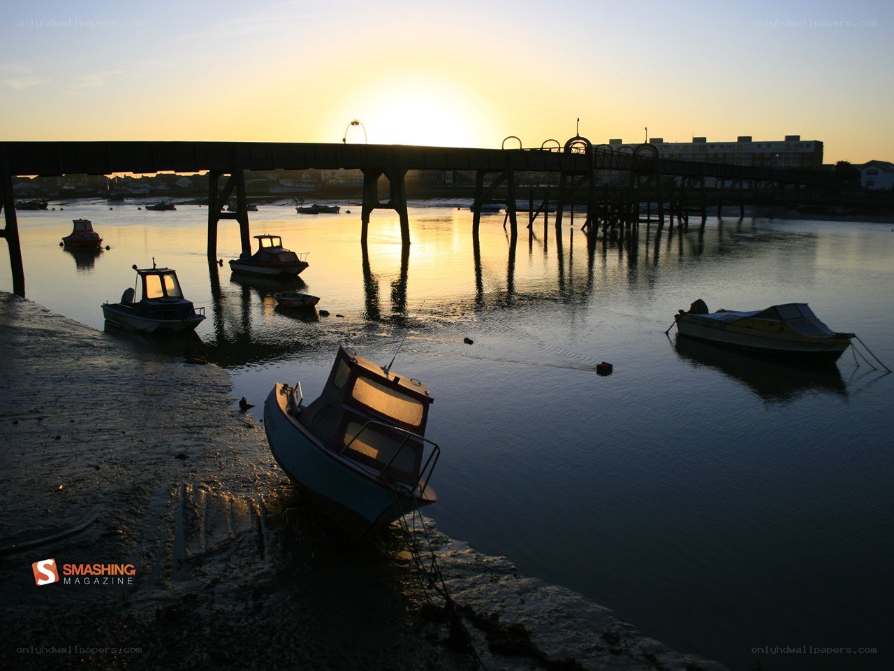 Boats at sunset by the pier
