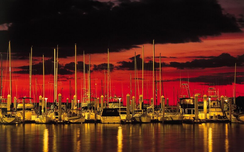 Boats at sunset in a marina
