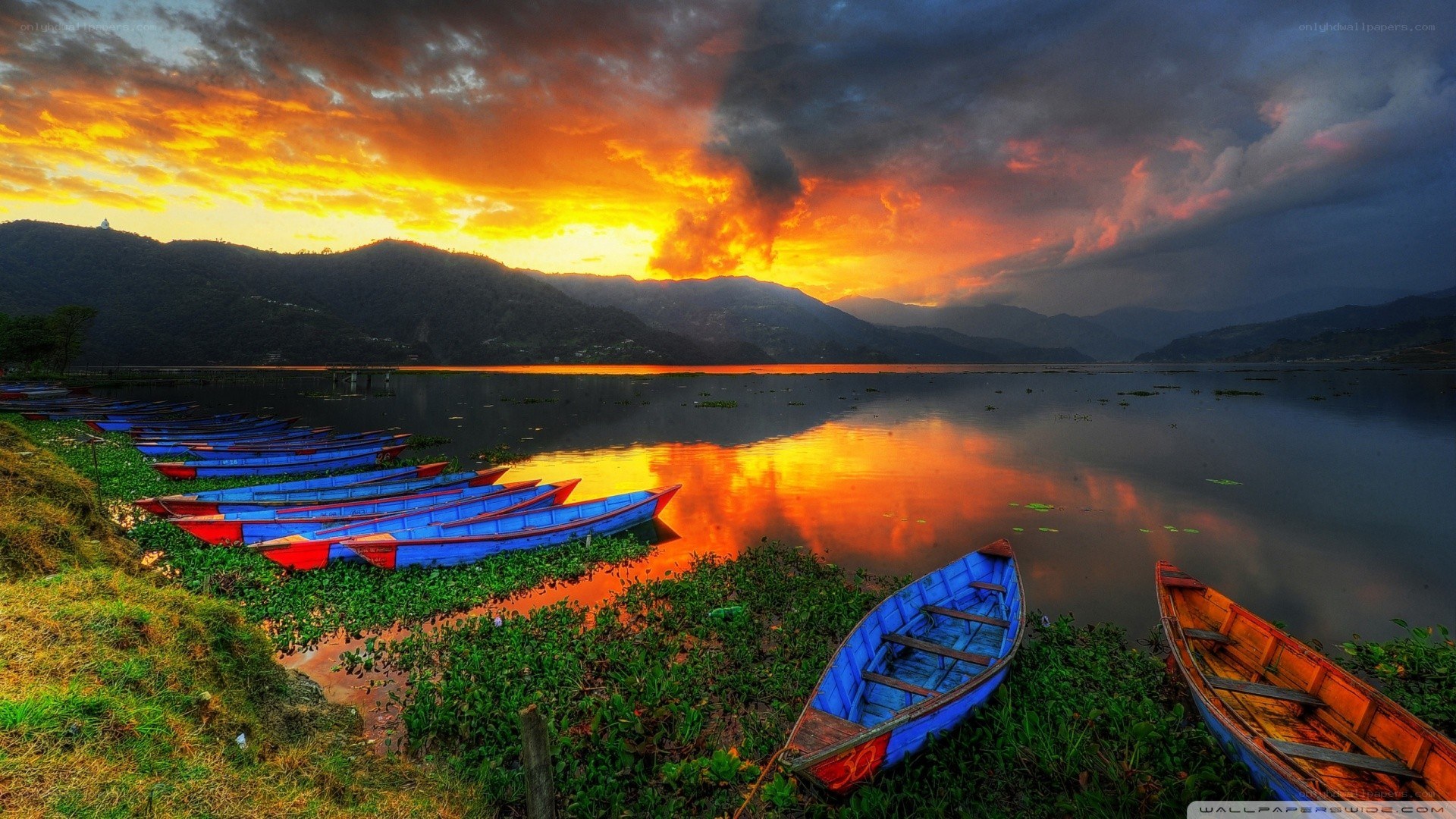 Boats at sunset on a lake