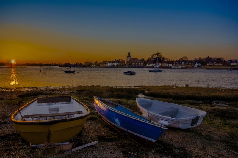 Boats at sunset on a river