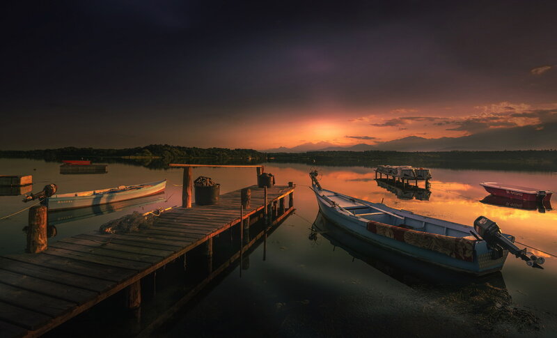 Boats at Sunset — Orange, Serene, Photograph, Dock, Lake, Mountains