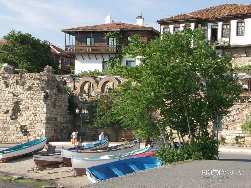 Boats by old stone walls