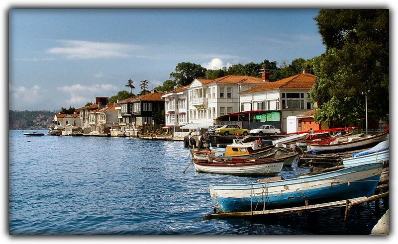 Boats docked at a coastal village