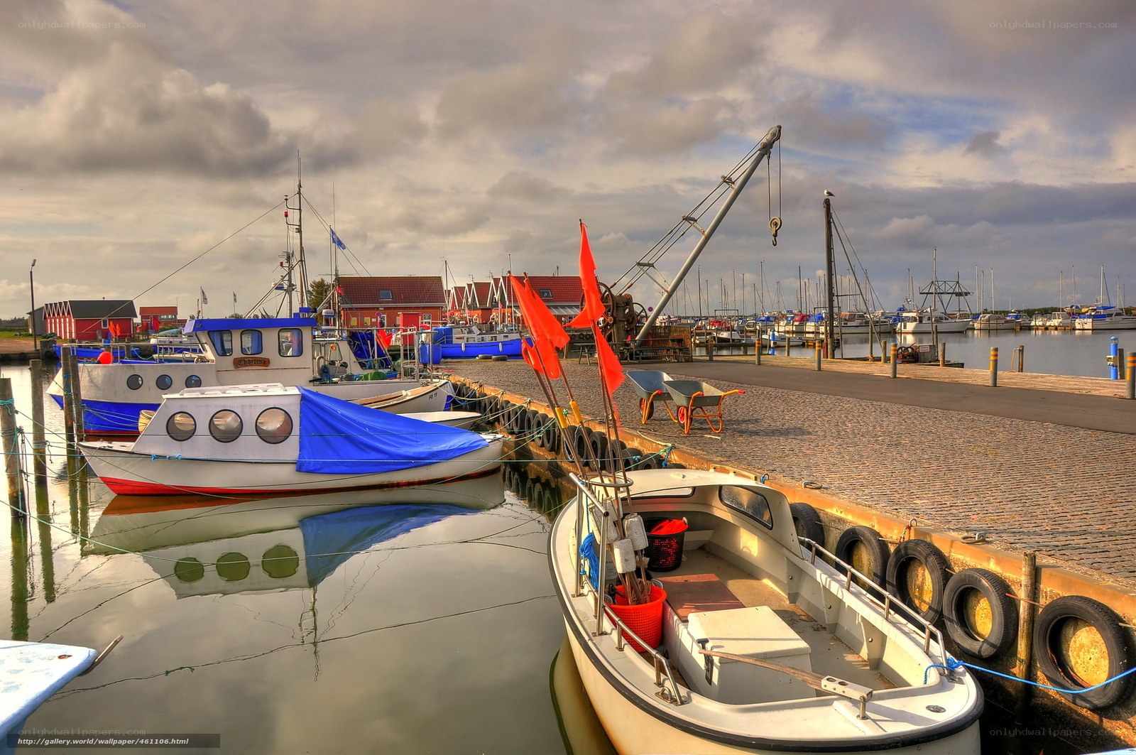 Boats docked at a harbor