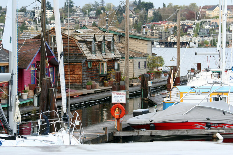 Boats docked at a waterfront marina