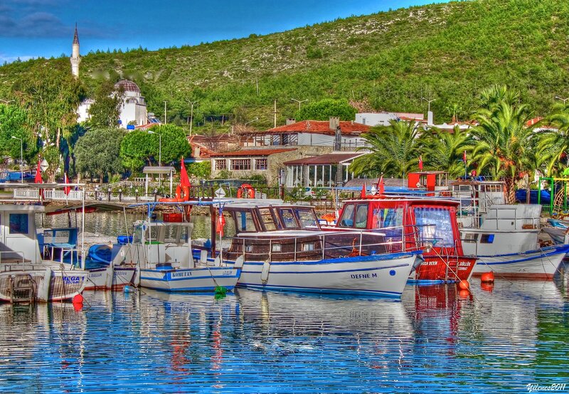 Boats docked in a coastal village