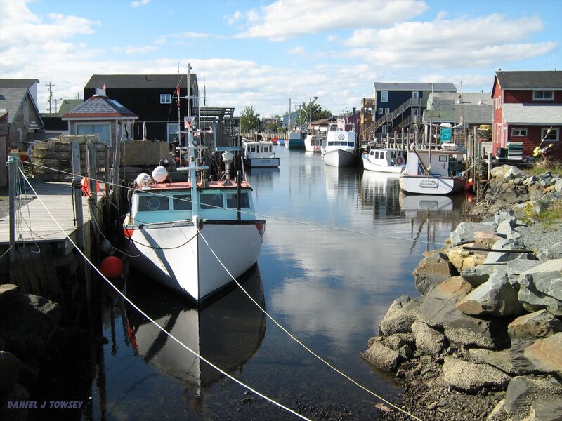 Boats docked in a harbor
