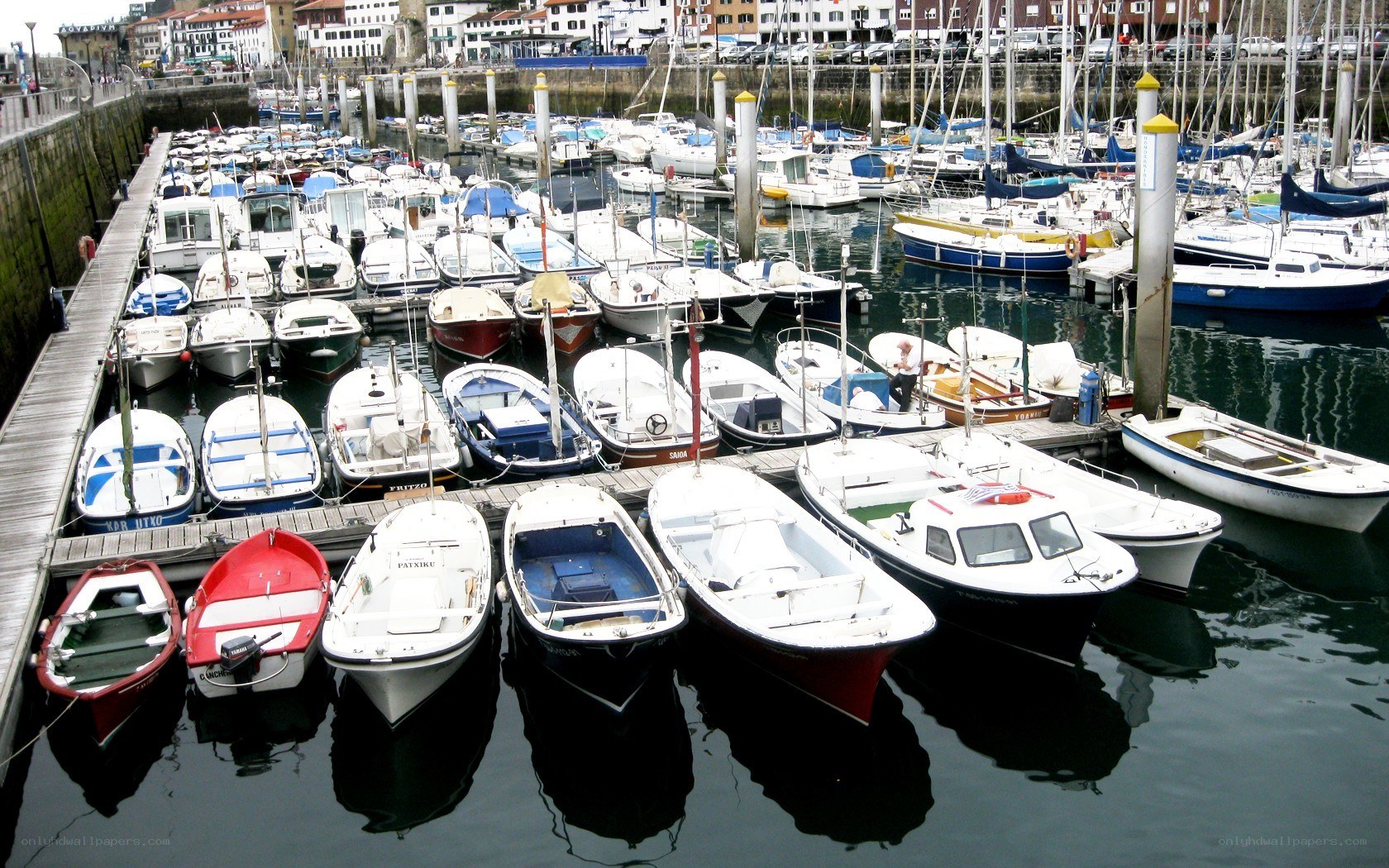 Boats docked in a harbor