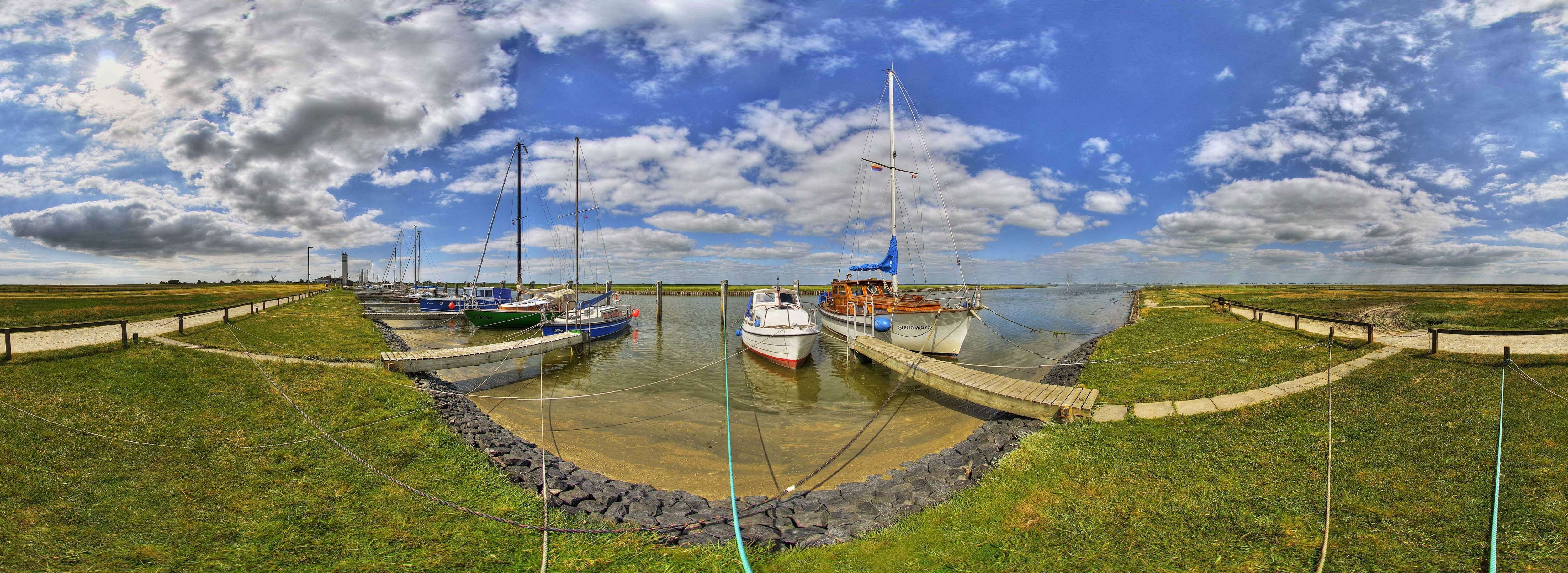 Boats docked in a harbor
