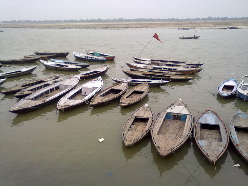 Boats docked on a river