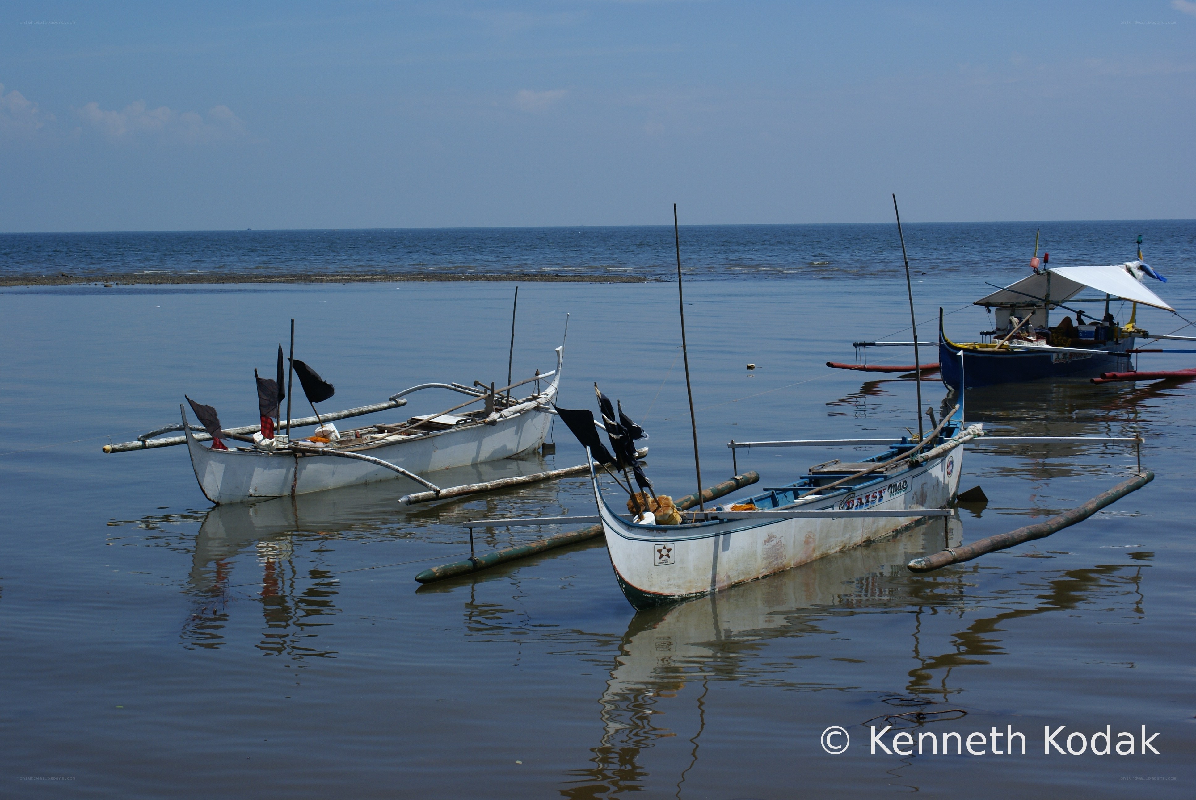 Boats floating in calm water