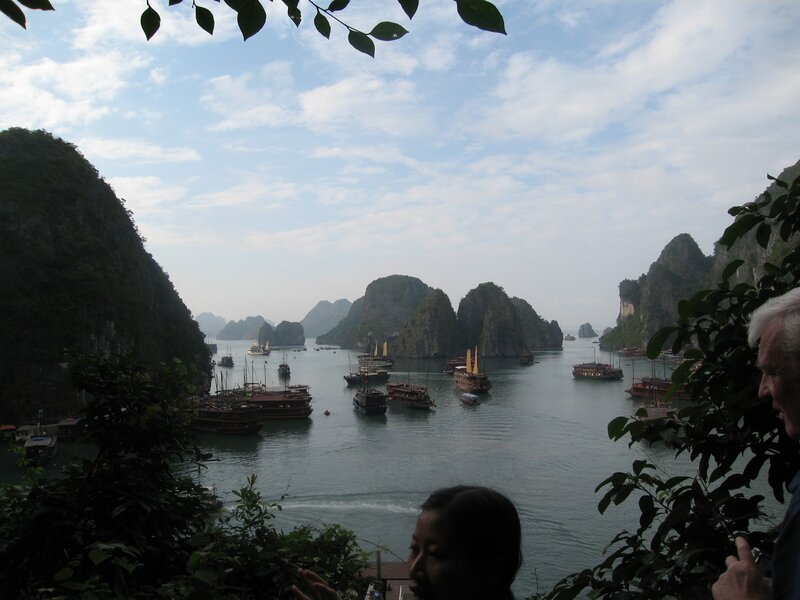 boats in a bay with karst islands