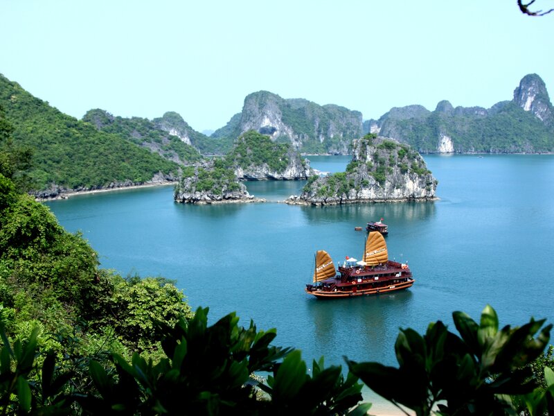 Boats in a bay with limestone islands
