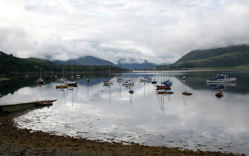 Boats in a calm Scottish loch