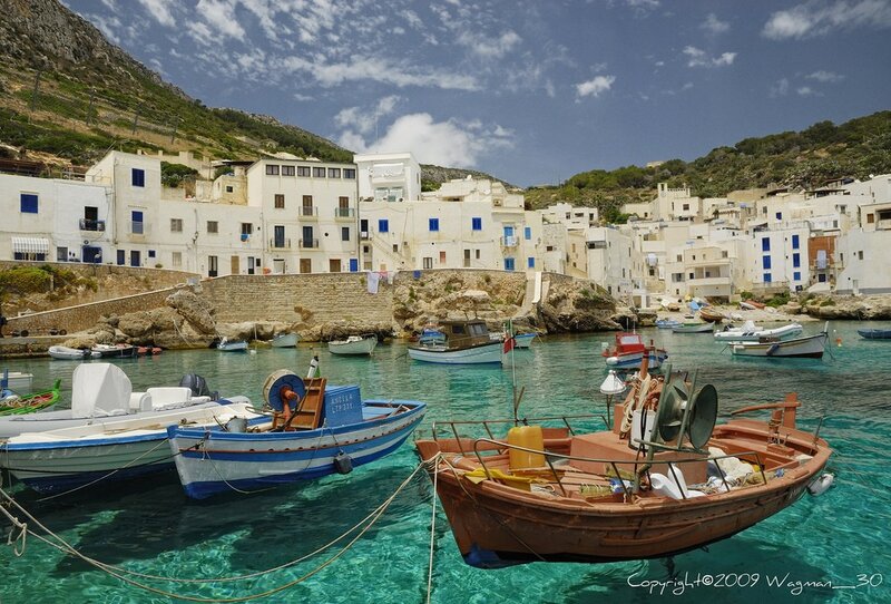Boats in a coastal village harbor