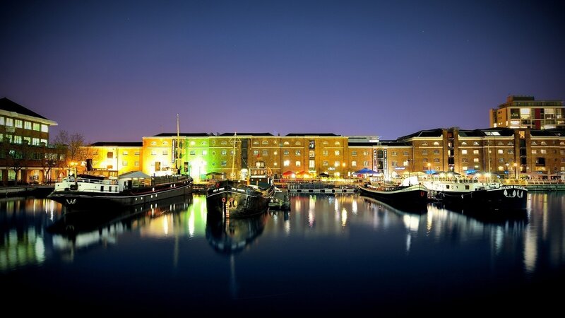 Boats in a Harbor at Night