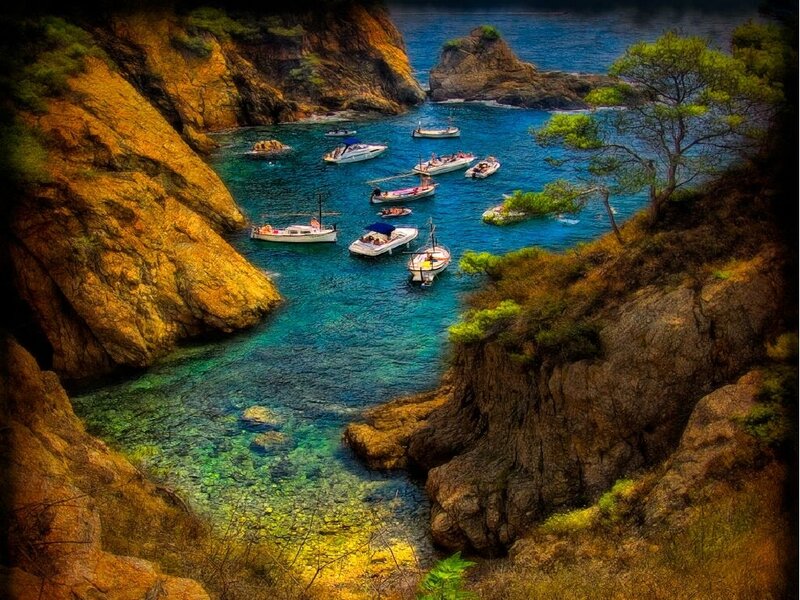 Boats in a rocky cove