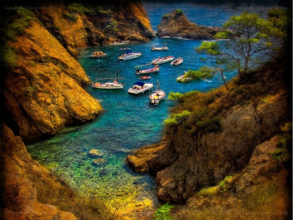 Boats in a rocky cove