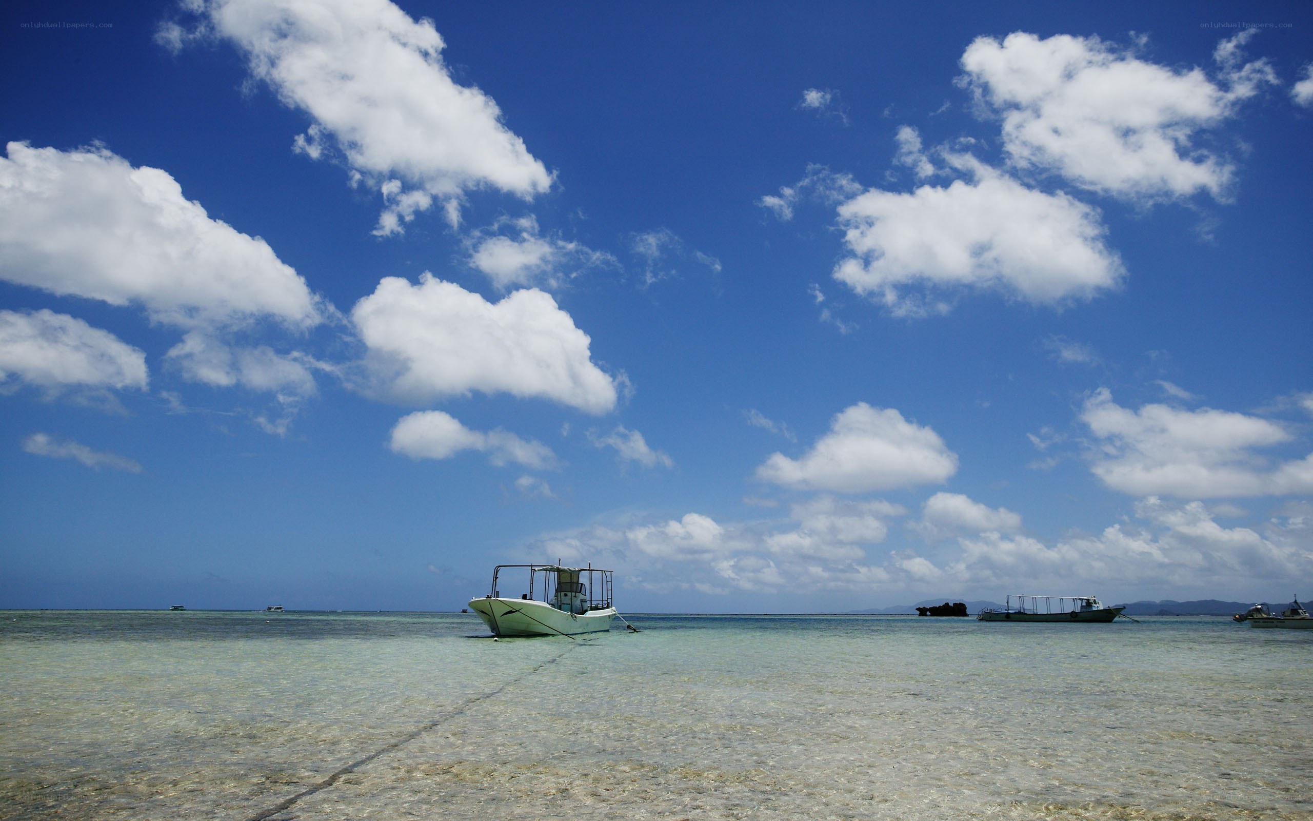 Boats in clear tropical water