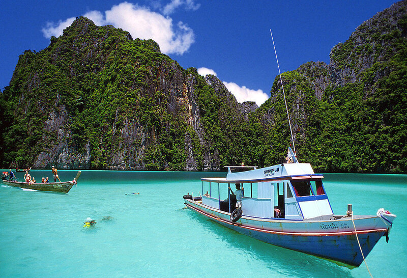 Boats in turquoise lagoon
