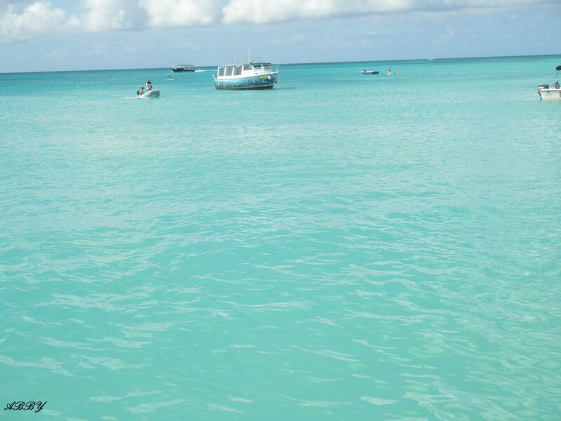 Boats in Turquoise Water — Serene