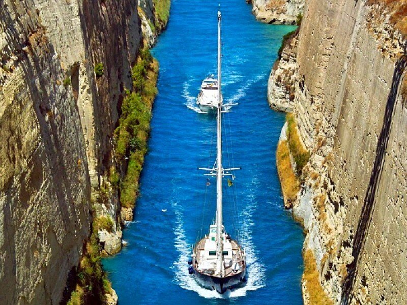 Boats navigating a narrow canal