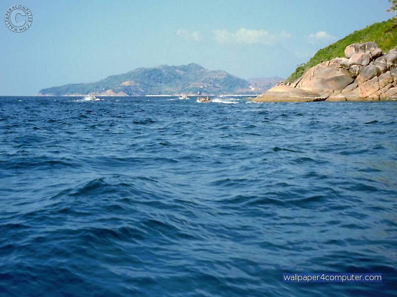 Boats Near Rocky Island