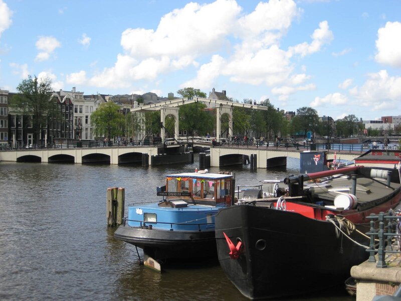 Boats on a canal in Amsterdam