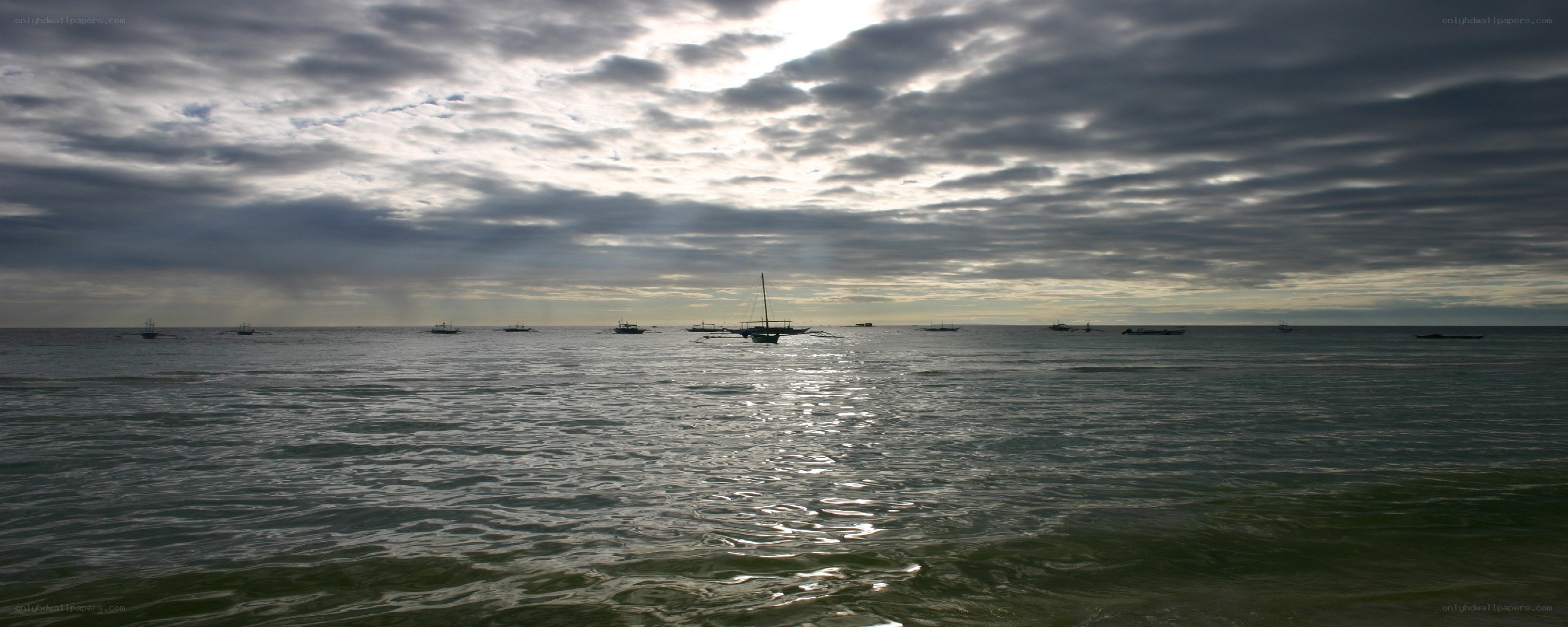 Boats on a cloudy sea