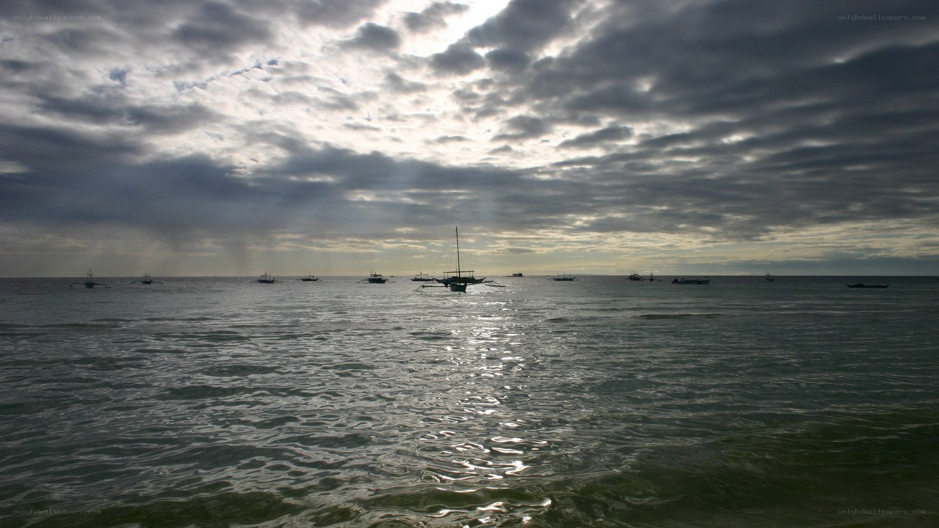 Boats on a cloudy sea