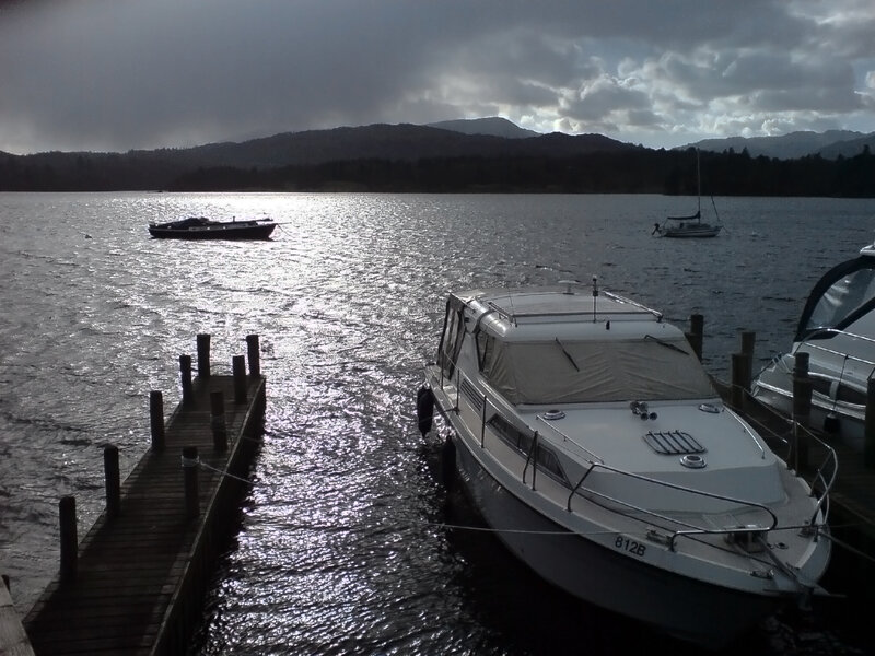 Boats on a lake at dusk