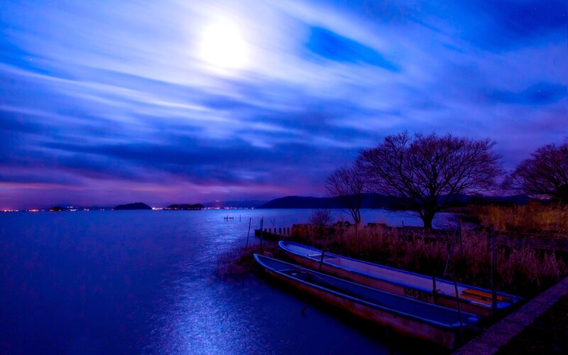 Boats on a Lake at Night