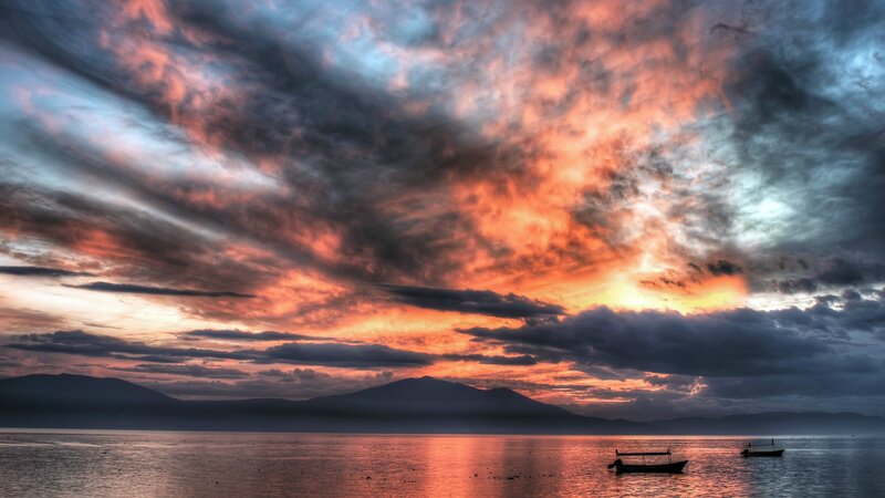 Boats on a Lake at Sunset — Orange, Dramatic, Photograph