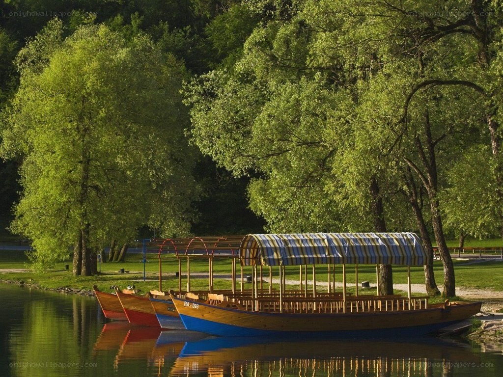Boats on a lake at sunset