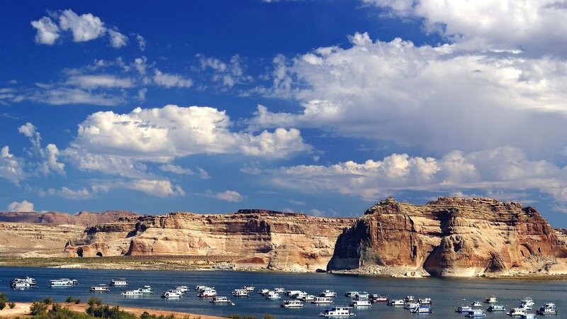 Boats on a Lake — Blue, Serene, Afternoon, Photograph, Rock Formations