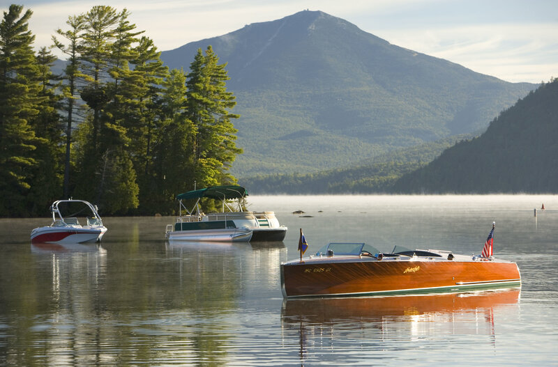 Boats on a lake with mountain view