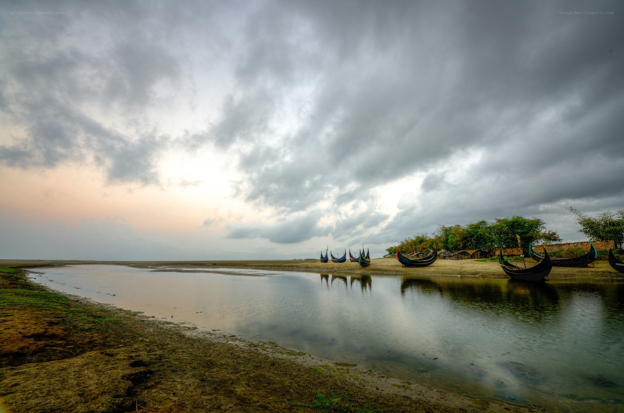 Boats on a muddy shore
