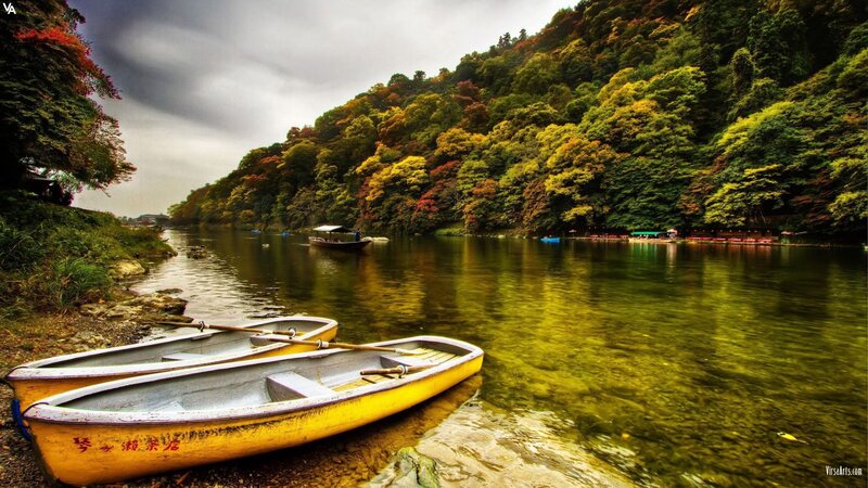 Boats on a river in autumn